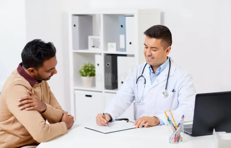 Doctor discussing treatment with a patient