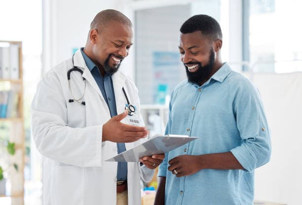 Doctor reviewing care plan with a patient